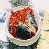 Steamed fish head with diced spicy red peppers
